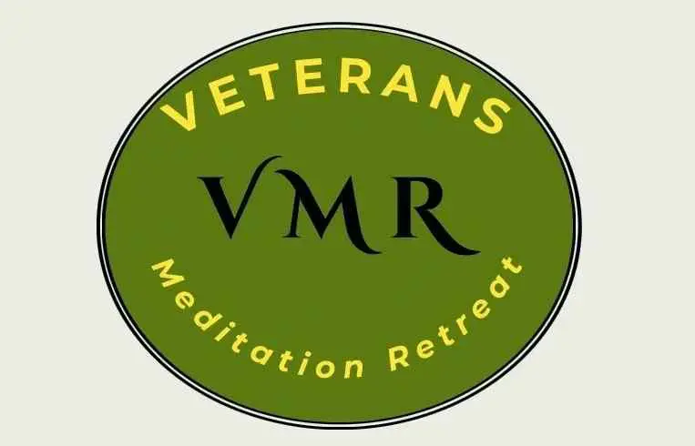 A green circle with the words veterans meditation retreat written in it.