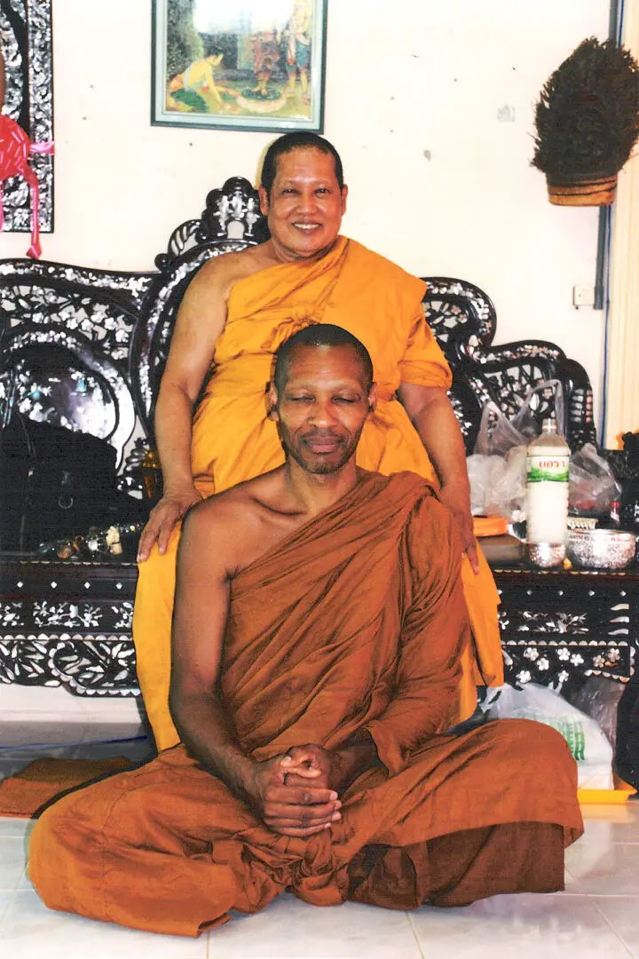 A man and woman in traditional thai garb.