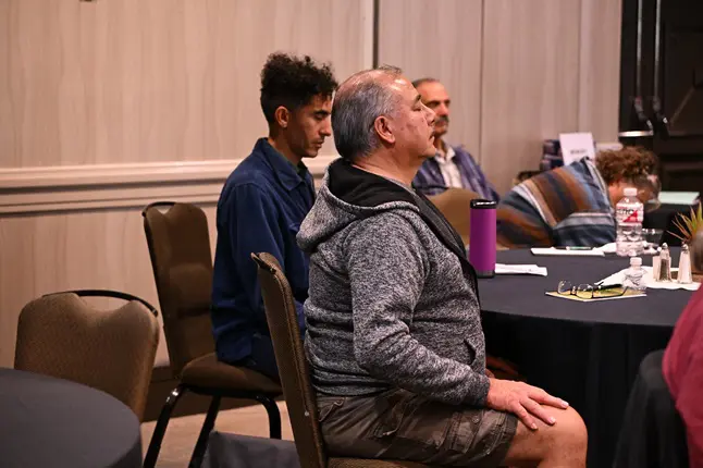 Veterans sitting quietly during a meditation session at the 2024 VMR.