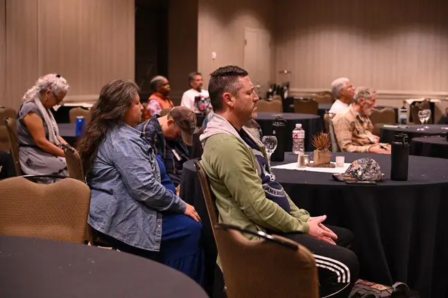 Veterans sitting quietly during a meditation session at the 2024 VMR.